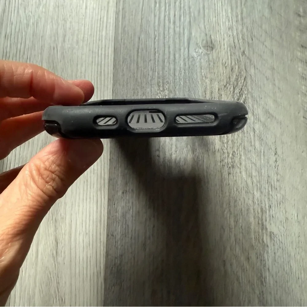 OtterBox iPhone 11 Pro Phone Case Black With Magnet Attached
